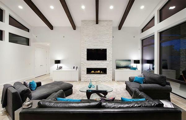 Living room in turquoise colors: the color in the interior is brown, a photo of a gray room with accents of chocolate-beige