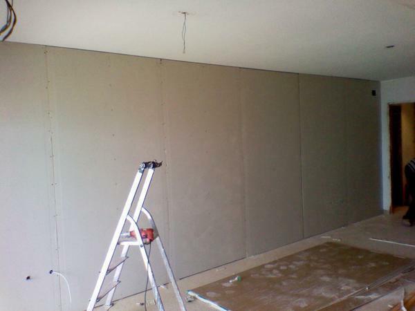 Dekorera väggarna i gipsskivor utan ram - en process som kommer att bidra till att spara utrymme