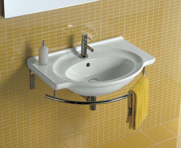 Mounting of the hanging sink is carried out with the help of dowels and screws