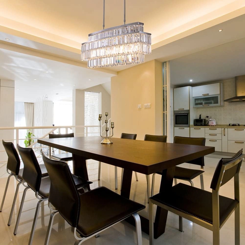 Vedhængslamper til køkkenet over bordet: smukt og moderne