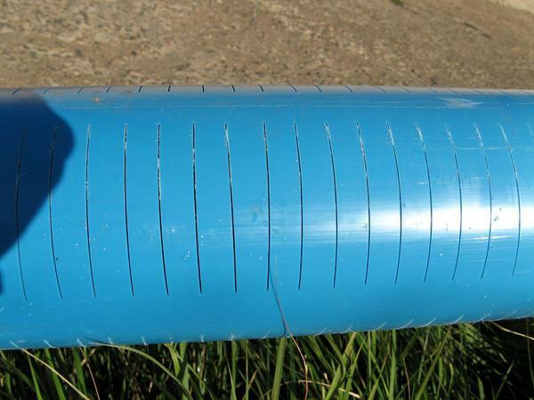 Filter für die Brunnen: macht einen Schlitz und kämmt mit ihren eigenen Händen, den Sumpf für Sand und Wasser aus dem Gehäuse