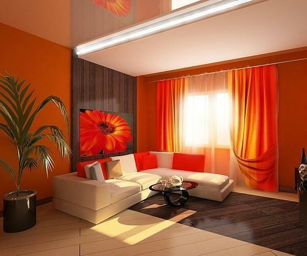 Orange wallpaper will help make the room more light and cozy