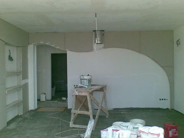 Select the design of plasterboard walls, taking into account the size and features of the room