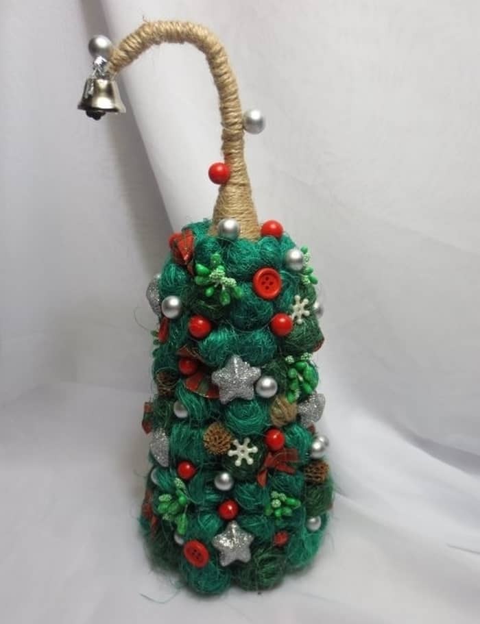 árvore Topiary - é um artefato bonita que vai ajudar a decorar o interior dos feriados do Ano Novo