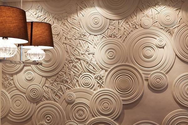 panel dekoratif: di dinding, di foto interior, tangan, sejarah dan bentuk, apa itu terbuat dari batu