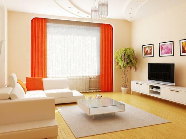 A világos narancssárga függöny ideális dekoráció a nappaliban modern stílusban