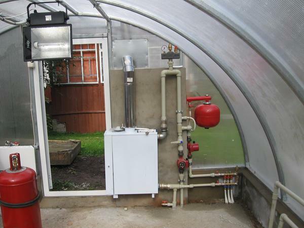 After the construction of the greenhouse, it is necessary to start creating a heating system, the central element of which will be a boiler