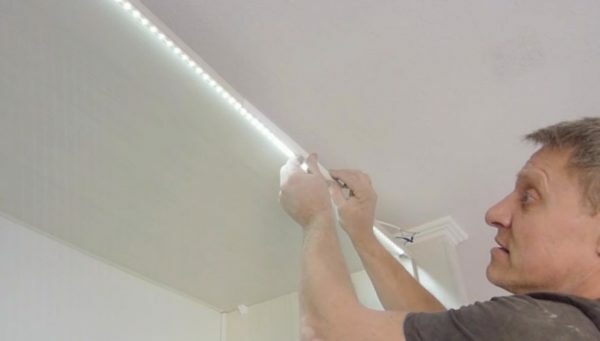 Securing tape with LEDs along the contour of the room, you can achieve an interesting effect