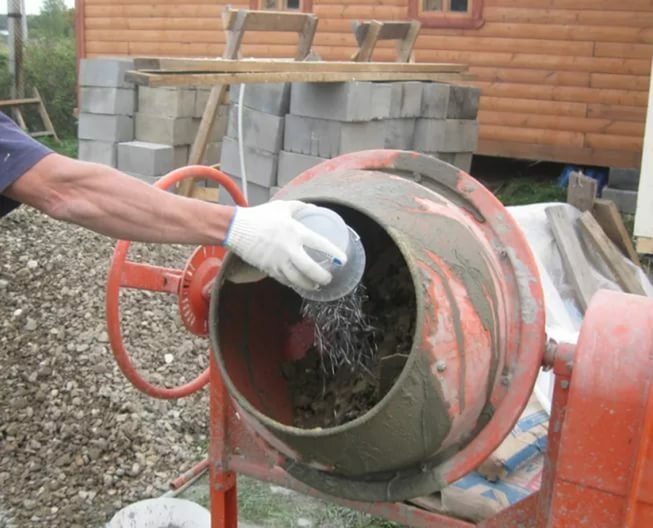 Fiberglass is added to the dry mixture before pouring into water mixer