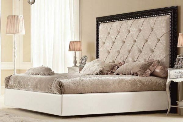 Attaching carved elements on the perimeter of the headboard can give a luxurious look