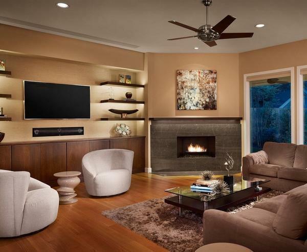 Corner fireplaces in the interior of the living room photo: hall with an electric falsh-fireplace
