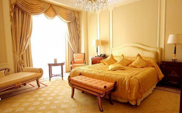 The curtains of the mustard color will perfectly fit in both the large and the small room