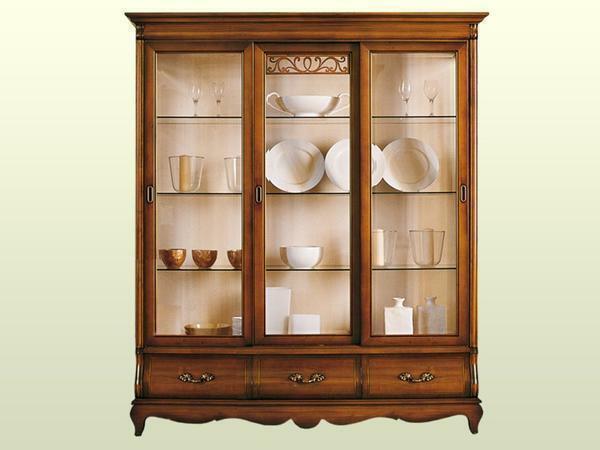 Organically in the interior of the guest room will fit a glass dish cabinet