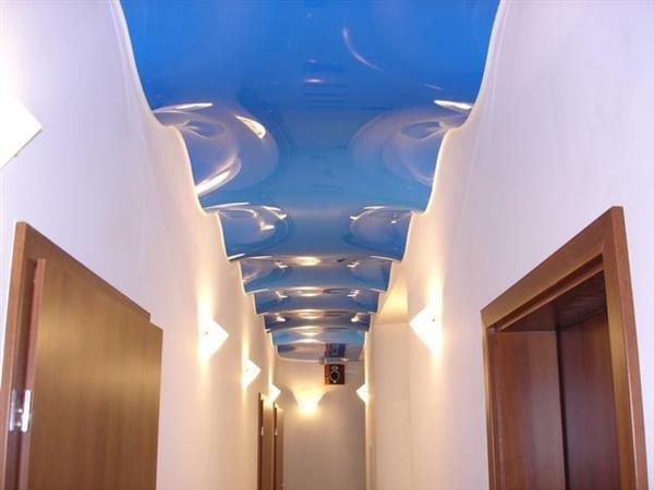 Stretch ceiling of complex geometric shape will bring to your interior unusual notes
