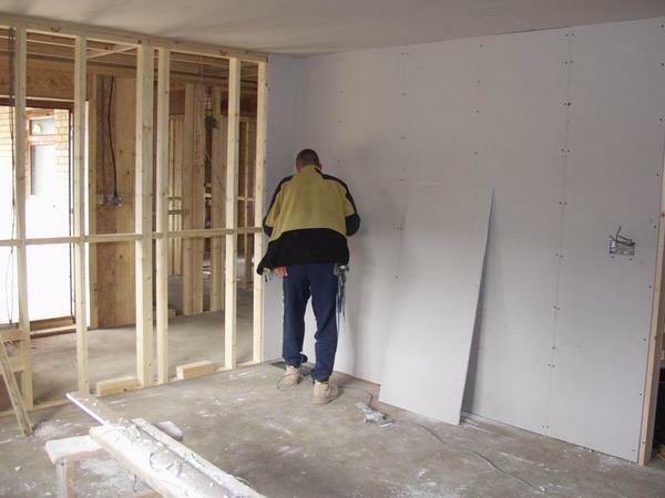 Align the walls in a wooden house with the help of a frame, on which sheets of plasterboard will be attached