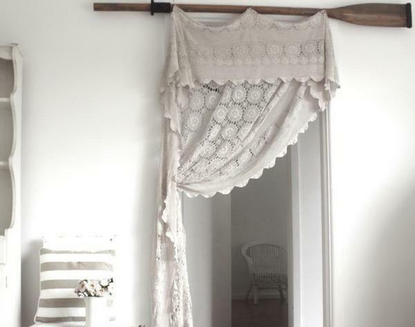 You can hang curtains in such a way that they do not fully cover the doors, and partly