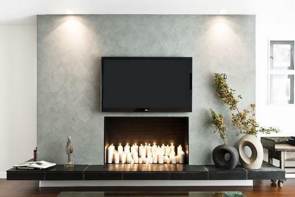 You can make a falsh-fireplace with candles and a special niche in the wall