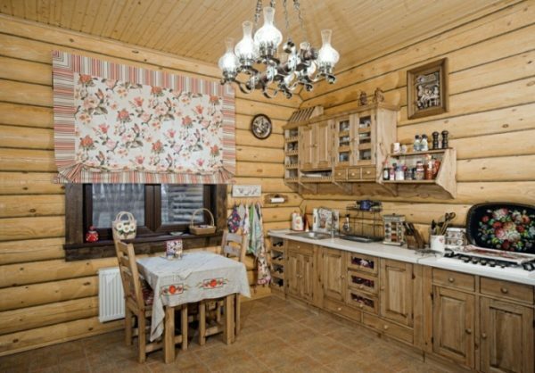 Wood trim walls and wooden furniture in rustic style, not varnished.