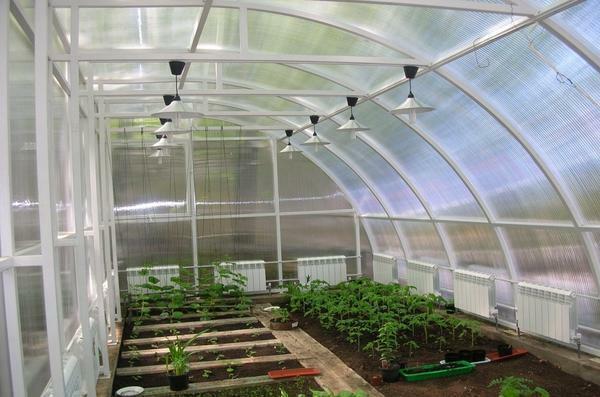 The frame of the greenhouse can be made of wood, plastic or metal