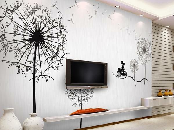 Un mur blanc dans le salon va ajouter des autocollants, papiers peints ou peint