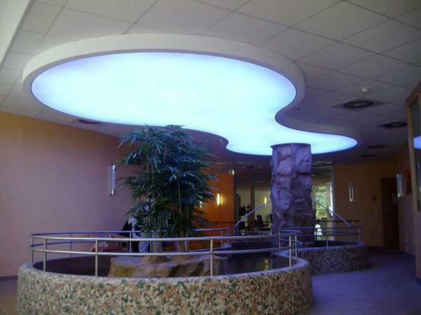 With the help of PVC panels you can make the ceiling lighter, and also achieve a visual increase in space