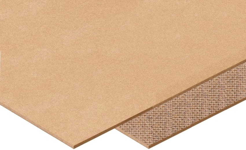 The front and back side of the sheet of chipboard