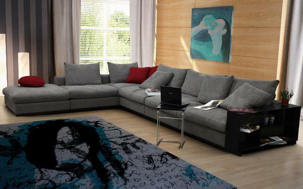 In the interior of a large living room perfectly fit the corner sofa neutral and calm colors
