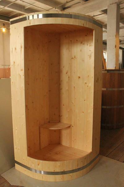 Wooden shower cabin for the villa is useful to the owner and guests