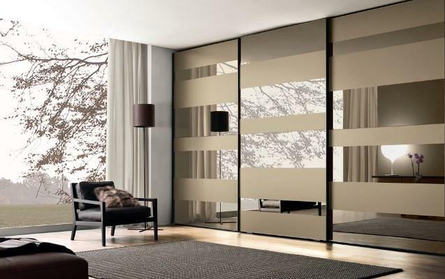 Sliding wardrobe in the living room in the wall: photo and interior design, large stylish furniture, doors and their decoration