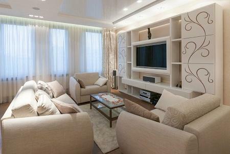 The living room, executed in beige tones, looks good both in artificial and daylight