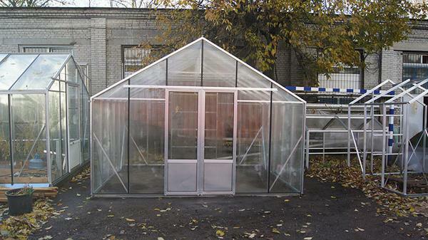 The greenhouse is made to order, so you can choose the color of the profile, as well as the filling material - glass or polycarbonate