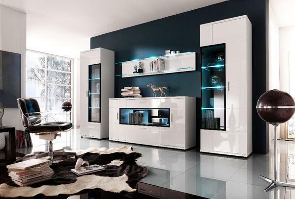 Modular wall can include a mini-bar, built-in lights, and even have a table with identical style