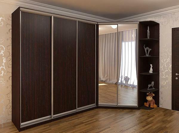 For a small size living room, it is better to choose a compact, but quite roomy corner-wardrobe