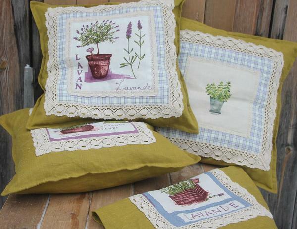 Pillows in the style of Provence perfectly fit into the interior of a country house