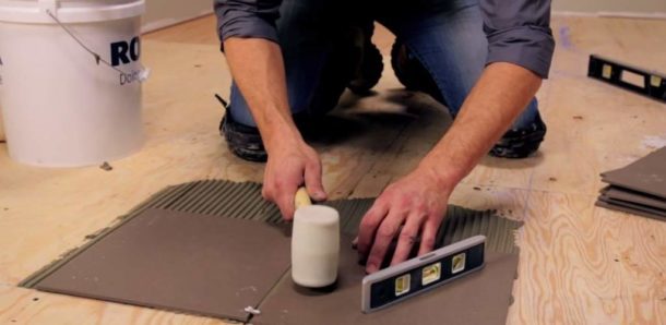 How to glue tiles on wood: preparing floor and walls