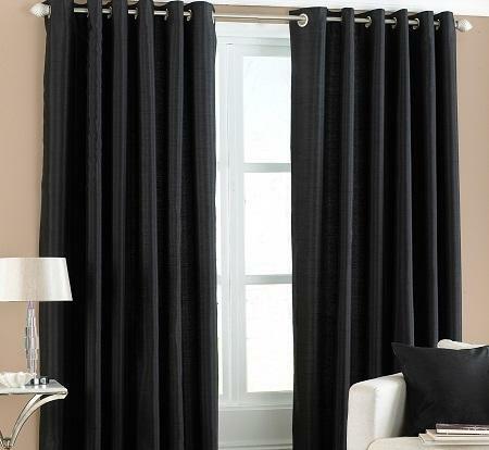 Black curtains in the interior look stylish and elegant