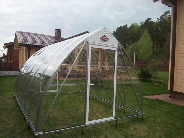 You can install greenhouses on piles on a well-compacted surface