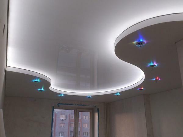 Properly organized lighting improves the aesthetics of the stretch ceiling, gives it a sophistication and originality