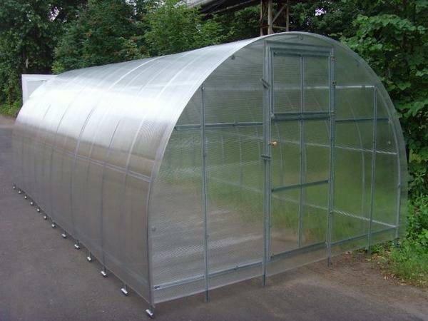 Frame greenhouses made of galvanized profile: polycarbonate manufacturer, reinforced greenhouse under the film, made of steel tape