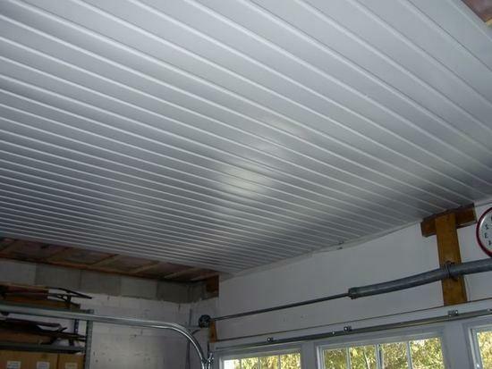 To finish the ceiling in the garage is better to use plywood or PVC panels