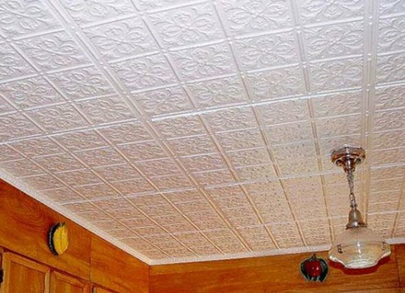 Tile is simply glued to the ceiling