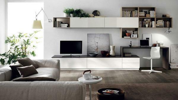In the living room, made in the style of high-tech, an excellent option is to combine the table with the wall