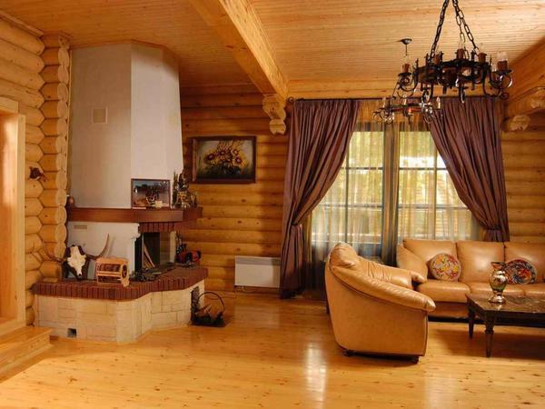 Without a doubt, for a wooden house, it is best to trim the ceiling with natural materials, for example, lining