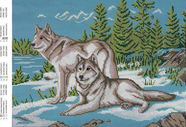 Broderi, som viser to ulver i skogen, ser komplett