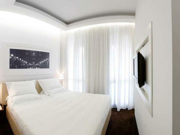 It is best for a small bedroom to use white colors in the interior, which visually increase the room