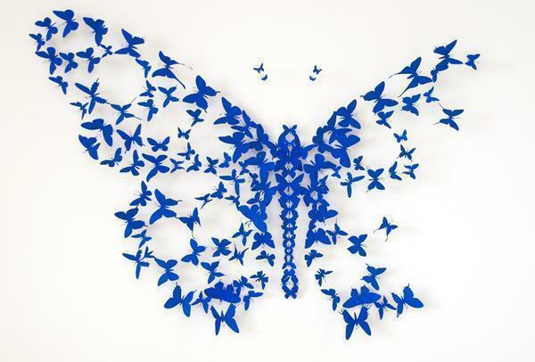 Creating a panel of butterflies in a stencilled way is considered to be simpler and at the same time original for the decoration of the room