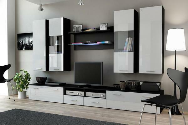 In the modern furniture interior there are gloss, varnished surfaces, natural or artificial stone