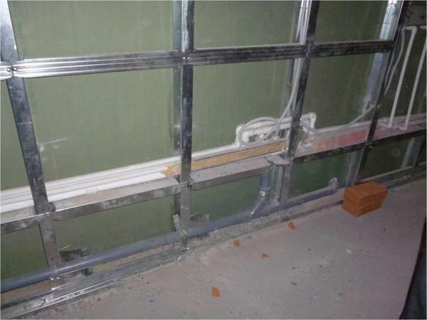 To install gypsum boards on the wall, it is necessary to construct a frame with the help of a galvanized profile