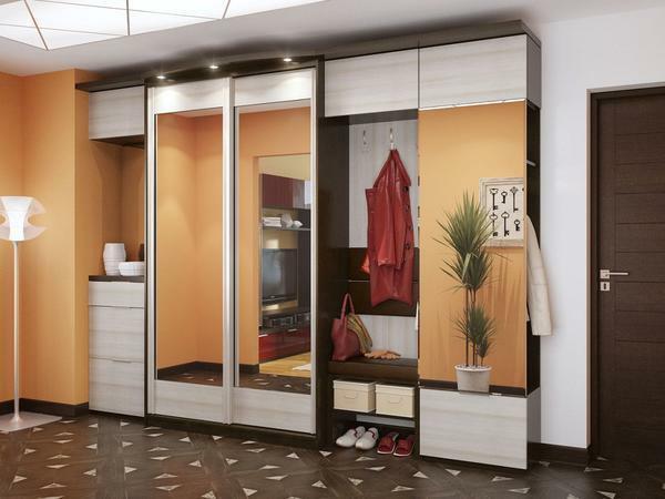 An excellent solution is the installation of point lights in the sliding-door wardrobes