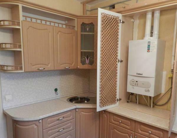 There are several ways to hide the gas boiler in the kitchen